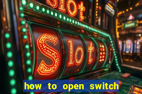 how to open switch oled game card slot