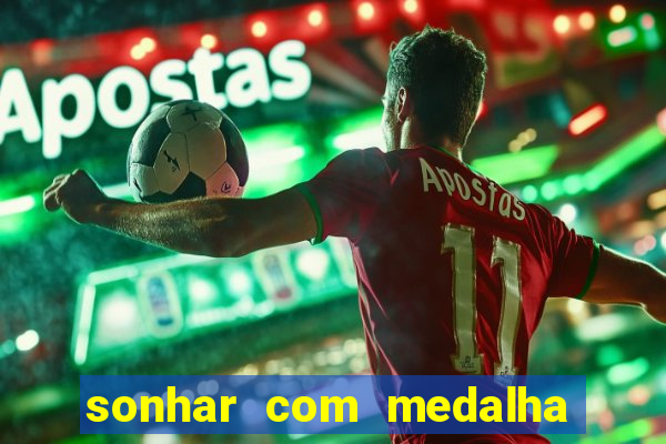 sonhar com medalha de santo